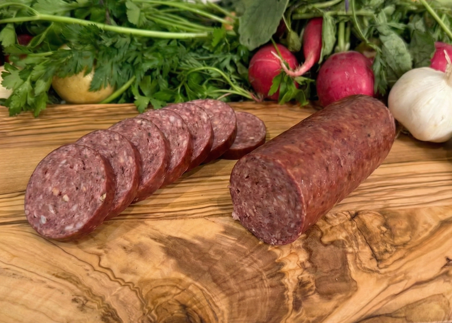 Beef Knackwurst on wooden board