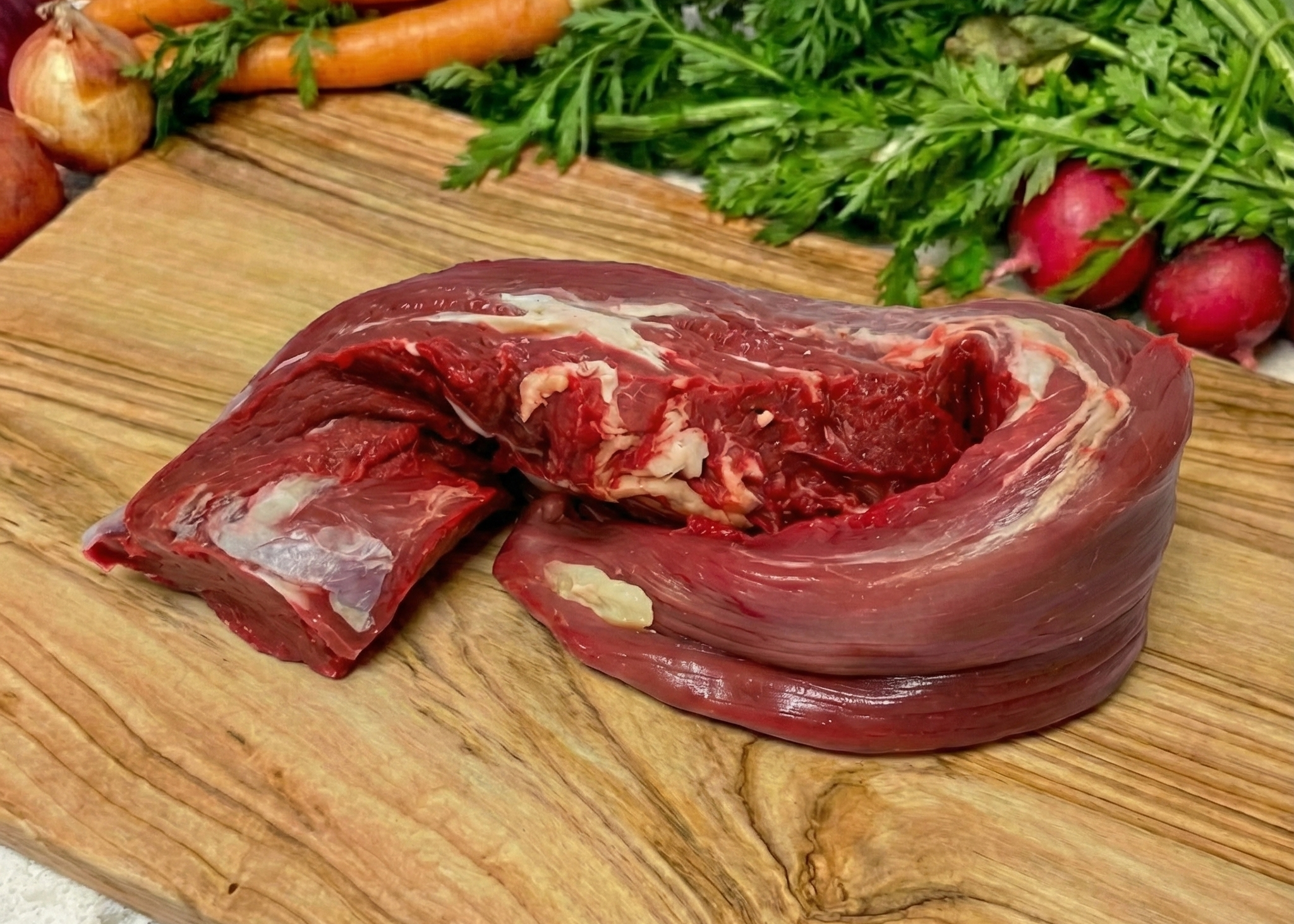 Beef Tenderloin Roast on a wooden board