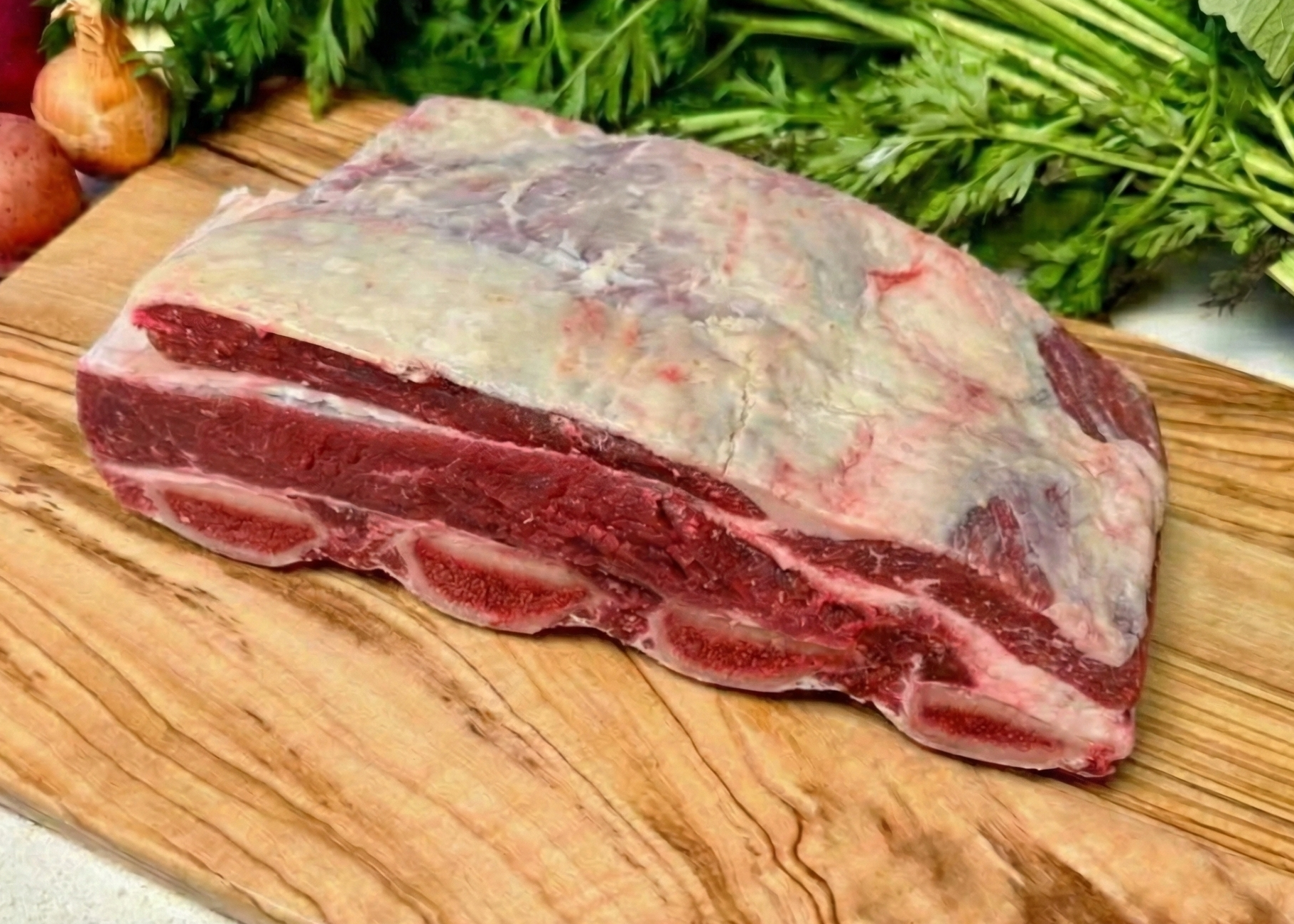 Buffalo Bone-In Short Ribs on a wood board