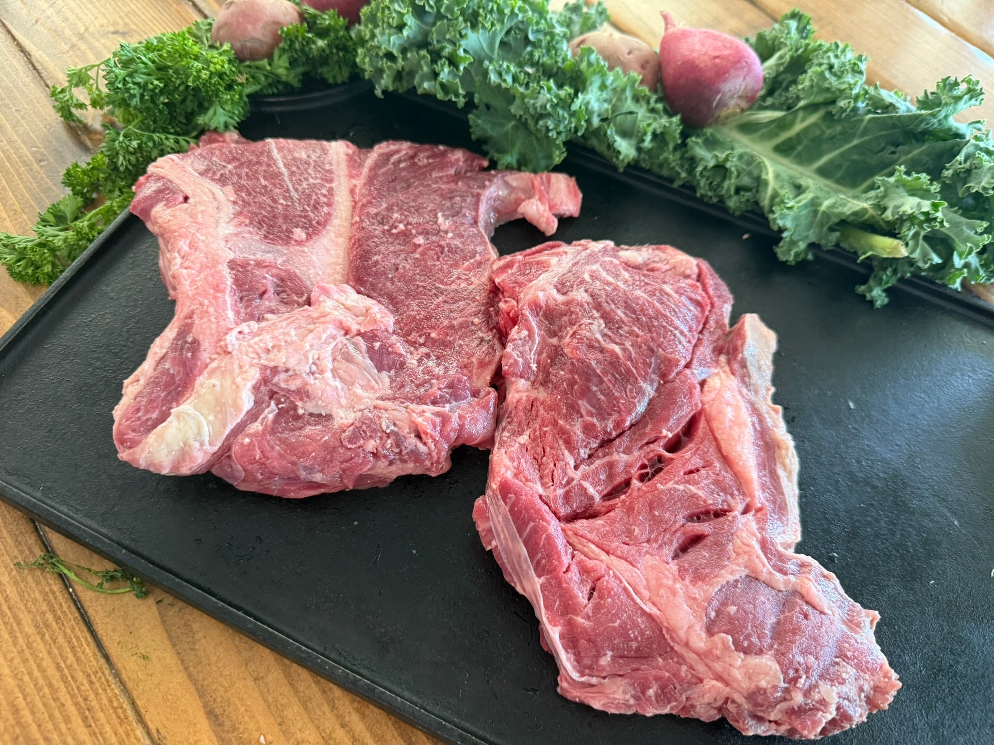 Buffalo Chuck Steak on a black pan