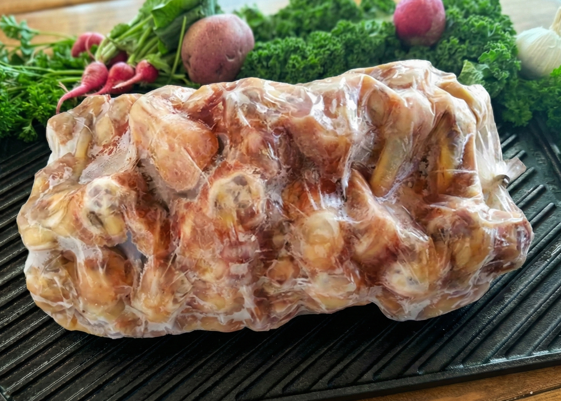 Chicken Marrow Bones on a black pan