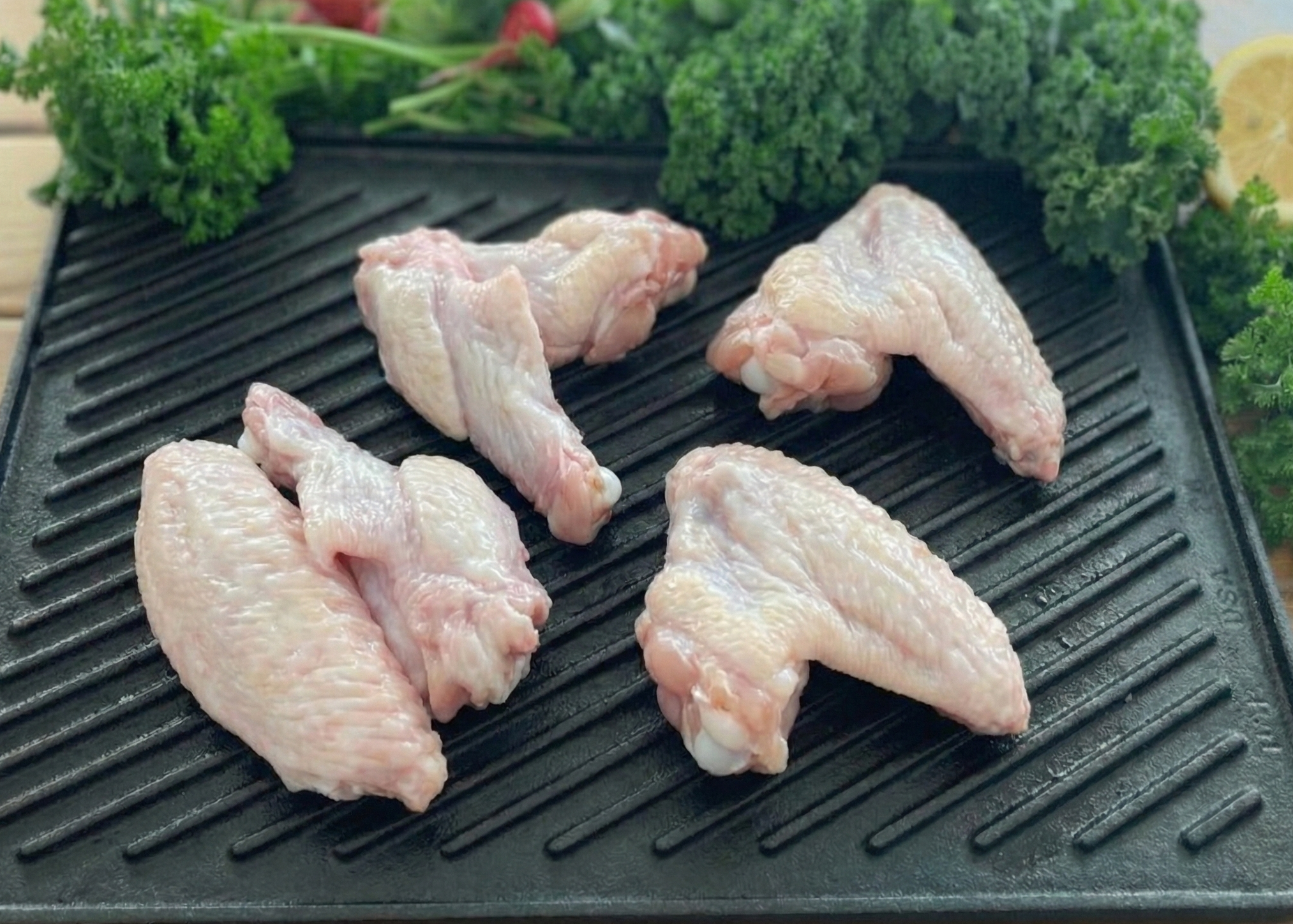 Omega-3 Chicken Wings on the black pan 