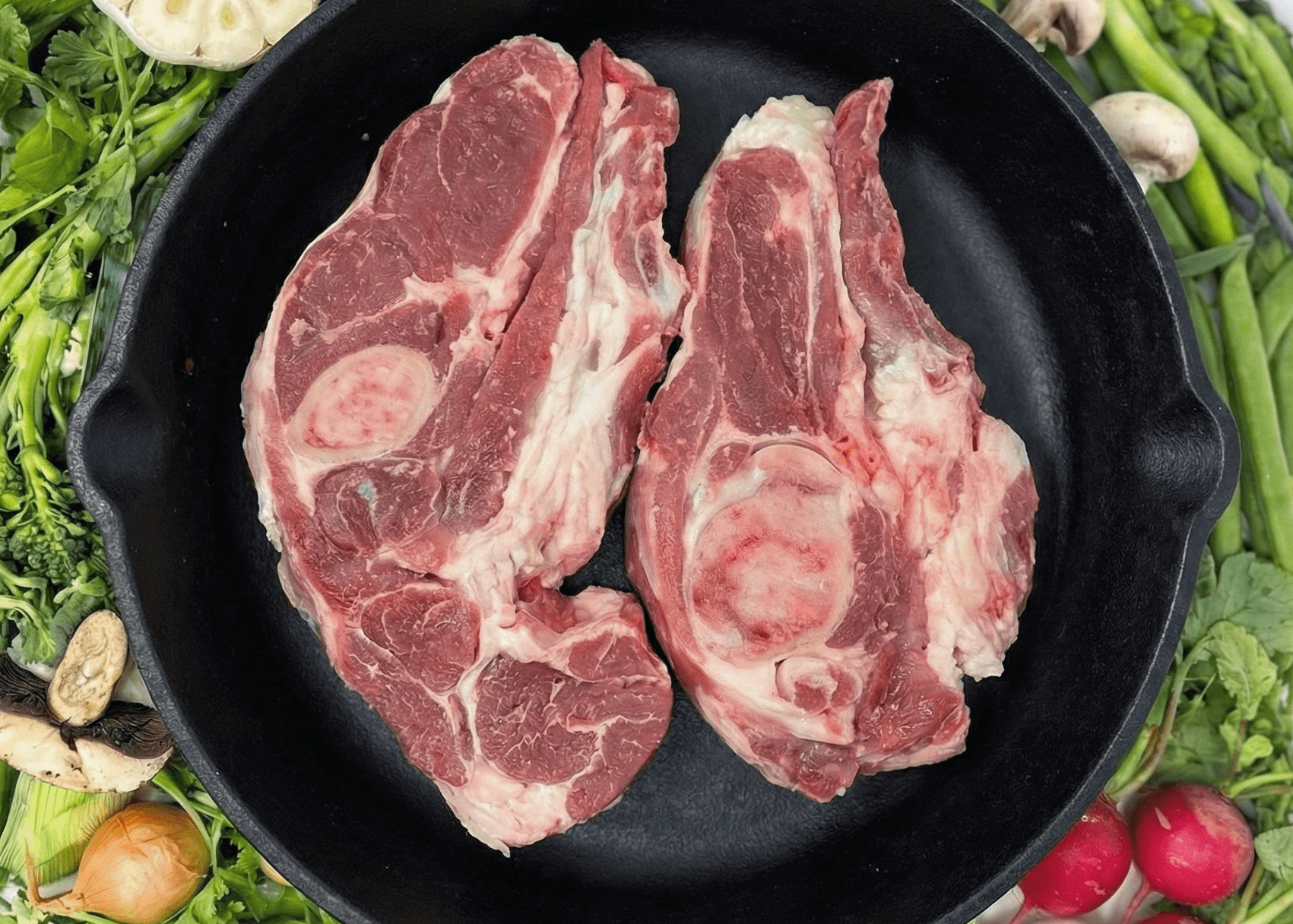 Pasture Raised Lamb Arm Chops in a pan 