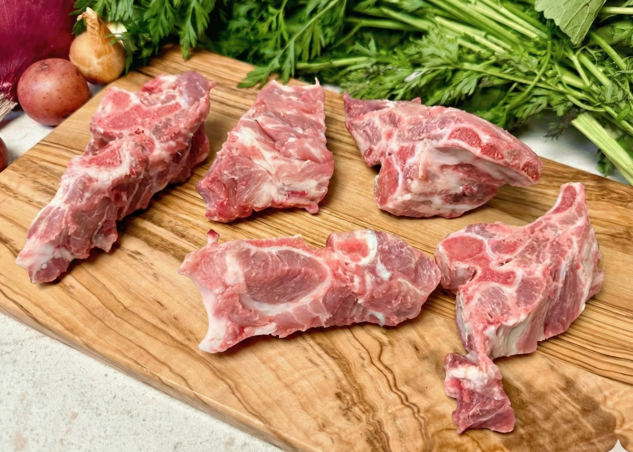 Pork Meaty Neck Bones on a board