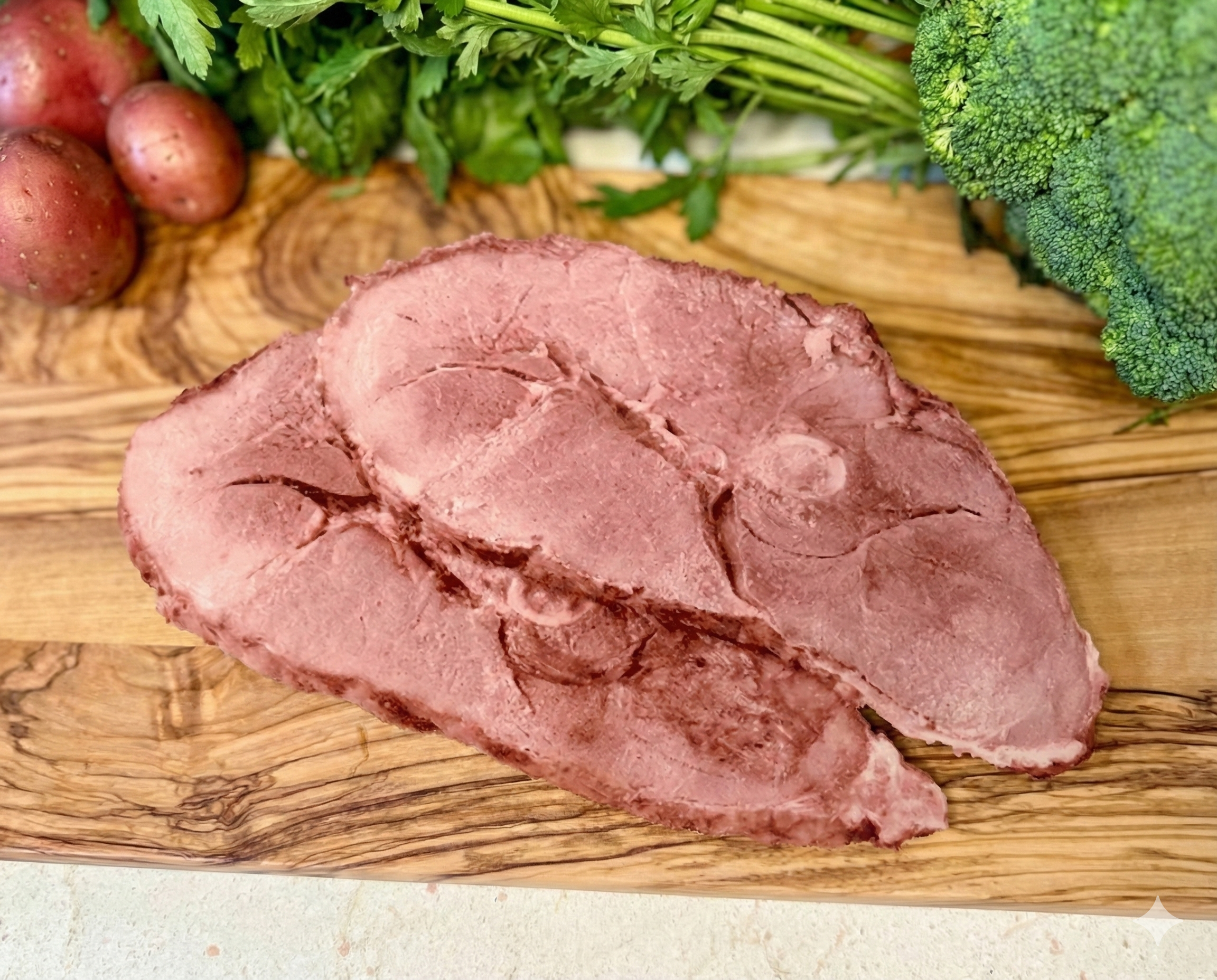 Smoked Small-Bone Ham Slices on a wood board
