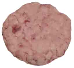 A picture of coarsely ground beef fat.